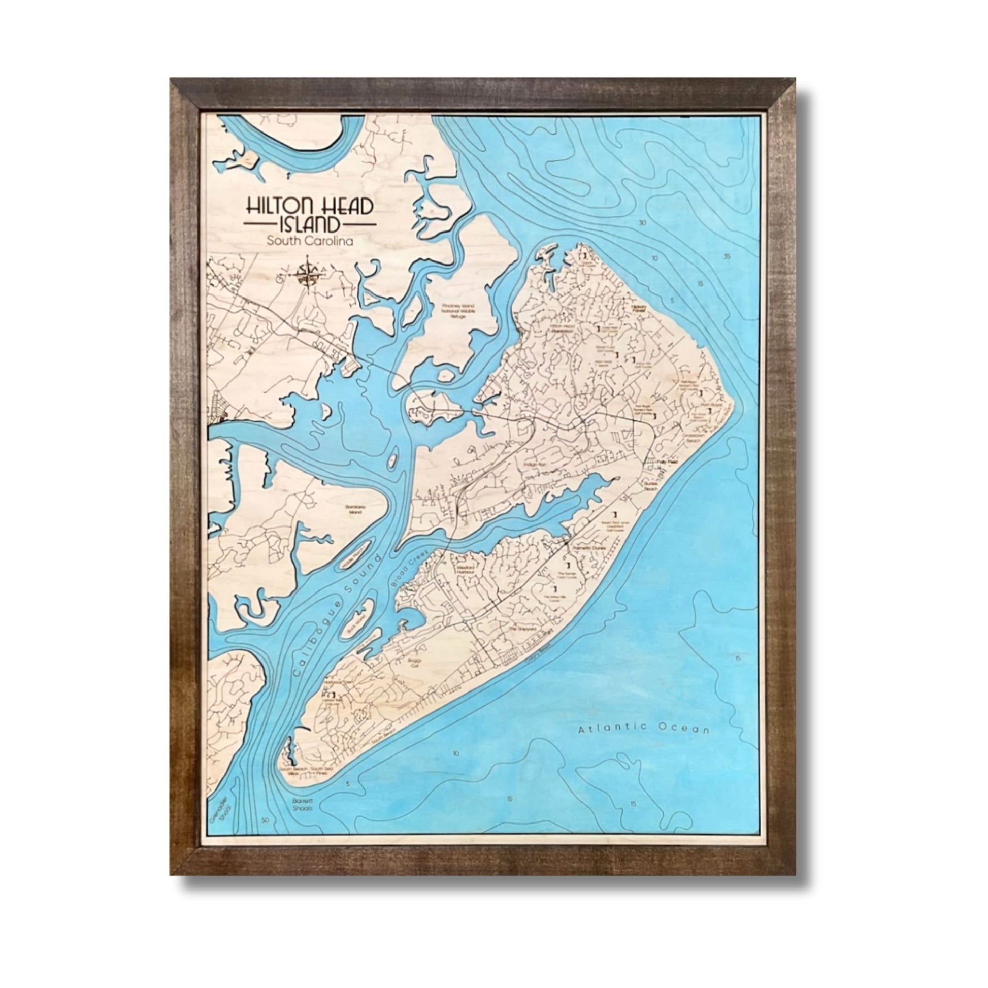 Engraved water layer wooden map of Hilton Head with light blue water stain. 