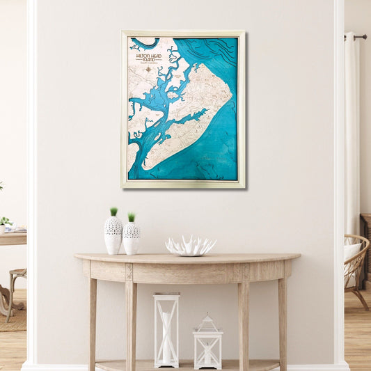 Multilayer Hilton Head wooden map hanging on wall above a table. 