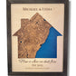 A house-shaped map showing the couple's neighborhood and coastline.