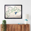 Framed wooden golf map of Jefferson City Country Club on a wall above a wooden console table.