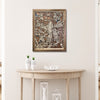 Framed wooden Kalamazoo city map on a wall above a wooden console table.