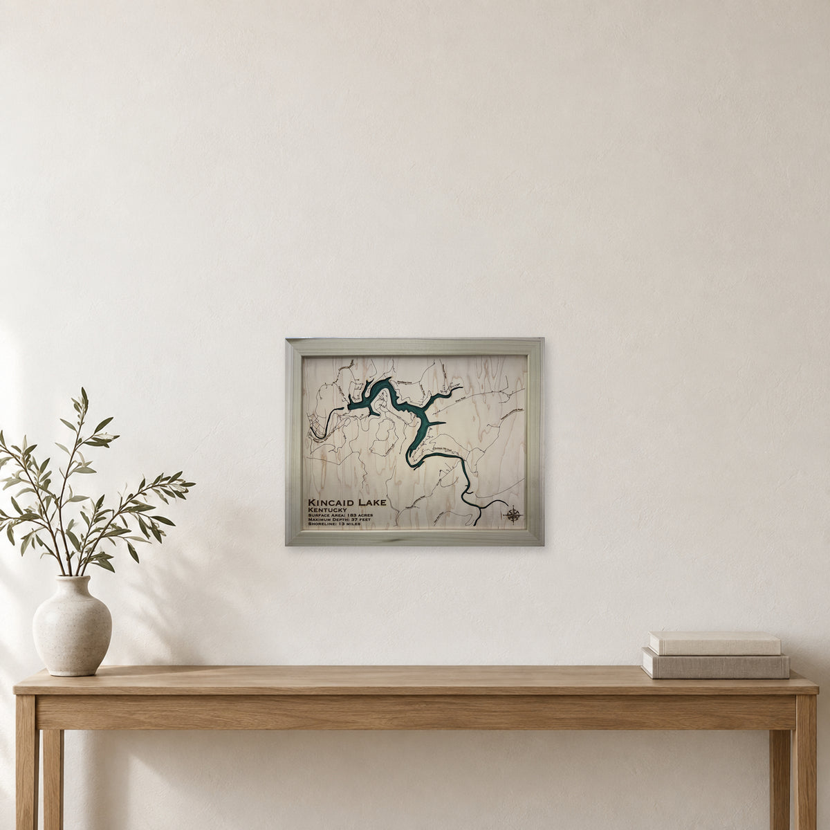 Kincaid Lake wood map — single layer with engraved contours, staged room mockup