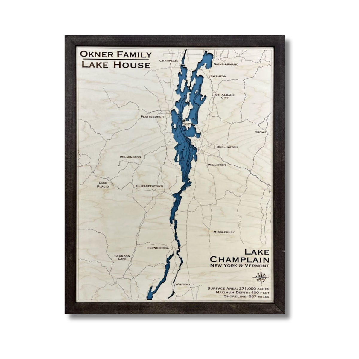 Lake Champlain wooden map with personalized title and black frame on a white background. 