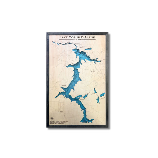 Framed map of Lake Coeur D'Alene with blue water and beige landmasses on a white background.