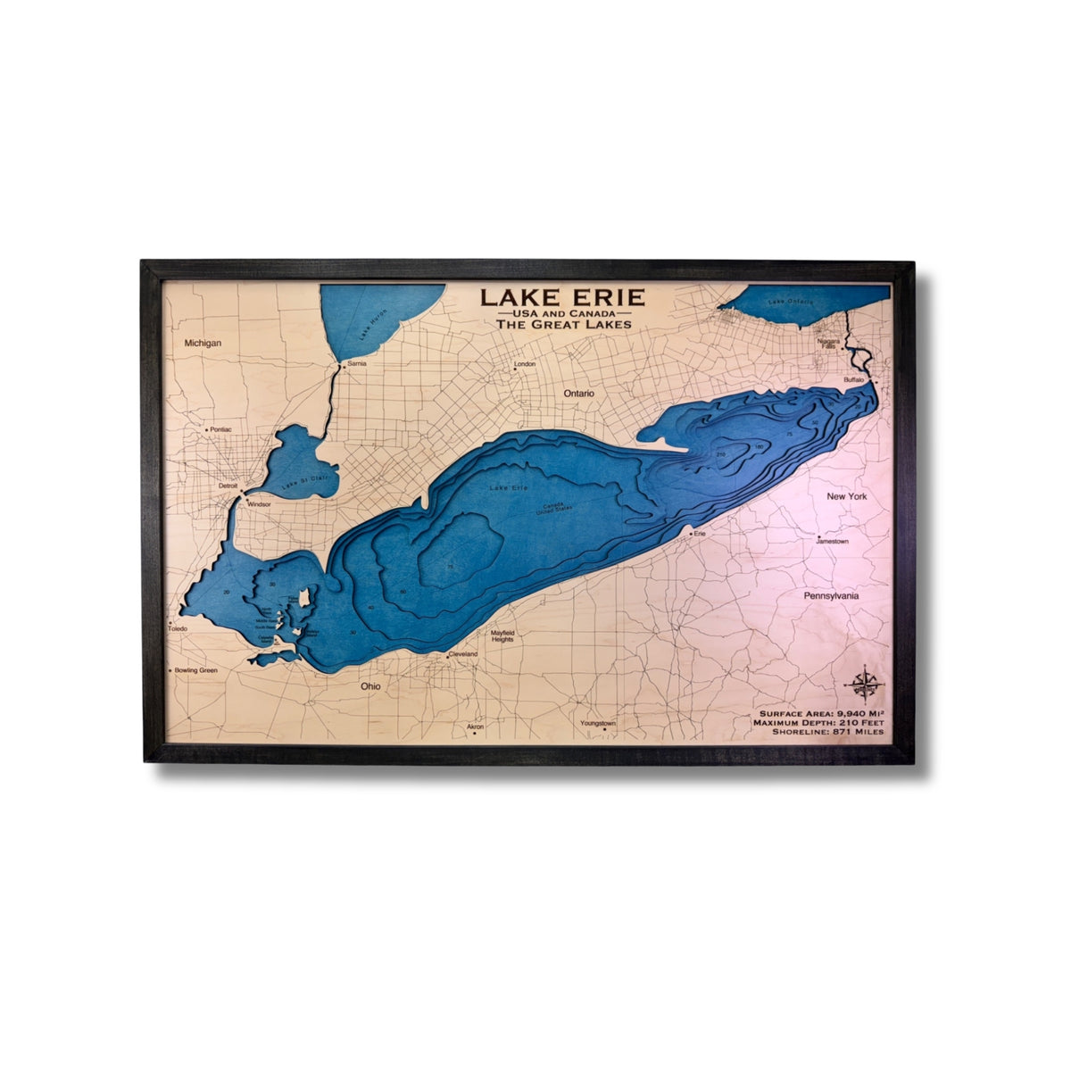 Wooden multilayer Lake Erie map on white background.