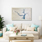 Wooden map of Lake Hartwell hanging on a wall in a living room above a sofa. 