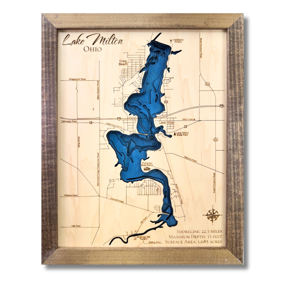 Multilayer wooden map of Lake Milton, Ohio with a dark blue water stain. 