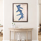 Custom wooden map of Mohawk Lake on a wall above a wooden table in a room.