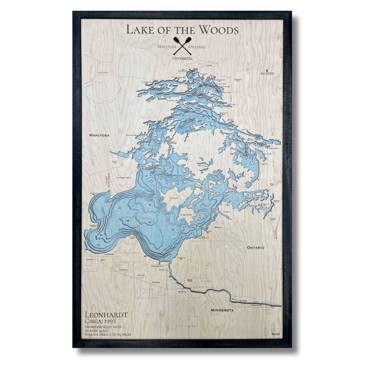 Wooden map of Lake of the Woods with light blue water stain and a black frame.