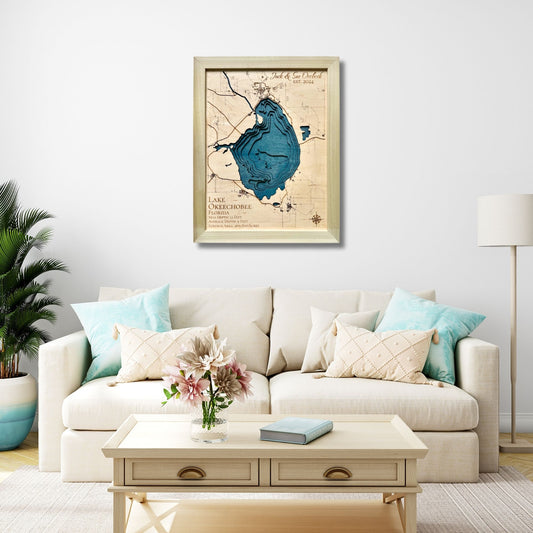 Custom Lake Okeechobee wooden map hanging on the wall above a sofa. 