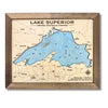 Wooden map of Lake Superior with a brown frame on a white background