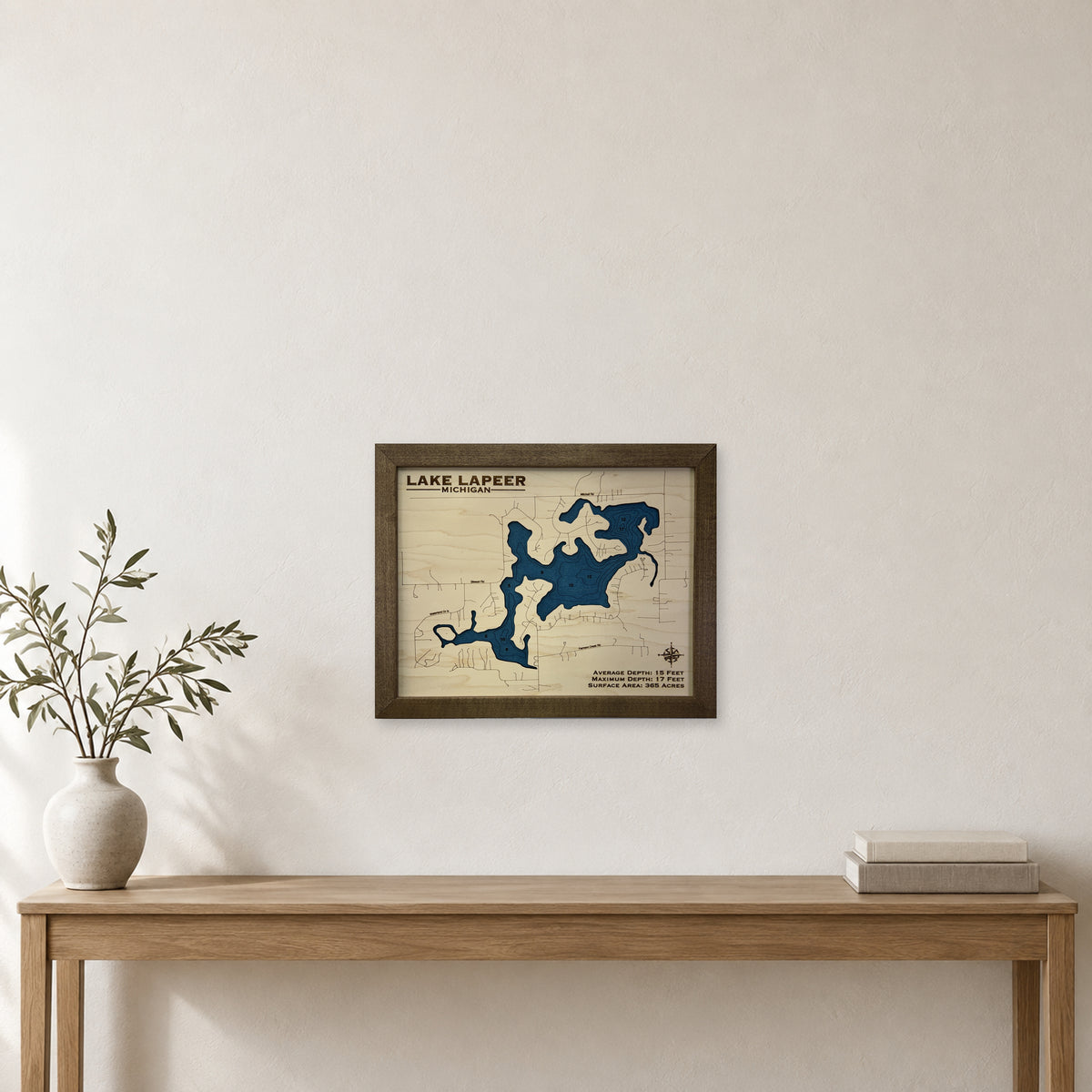 Lapeer Spaine wood map — single layer with engraved contours, staged room mockup