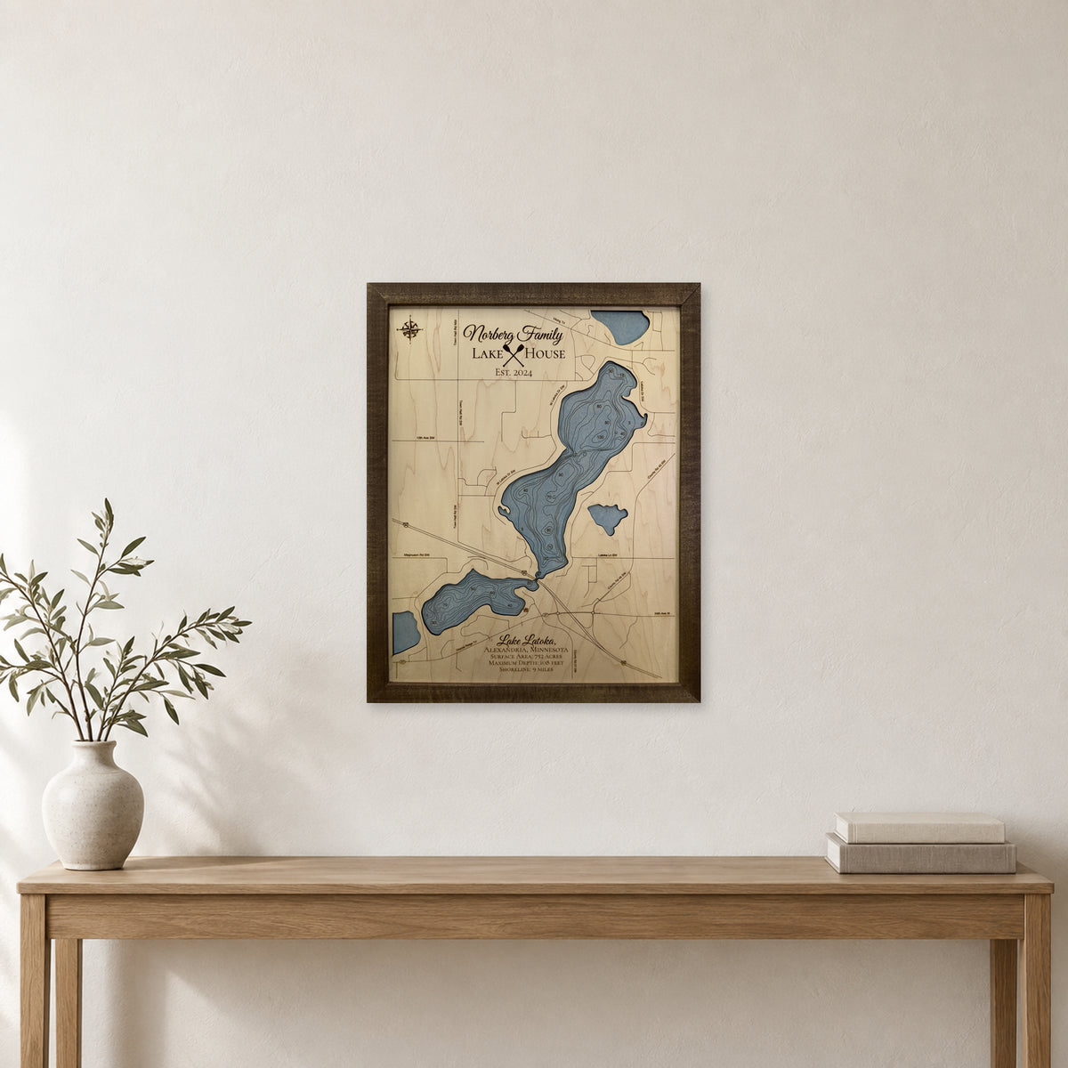 Latoka Norberg wood map — single layer with engraved contours, staged room mockup