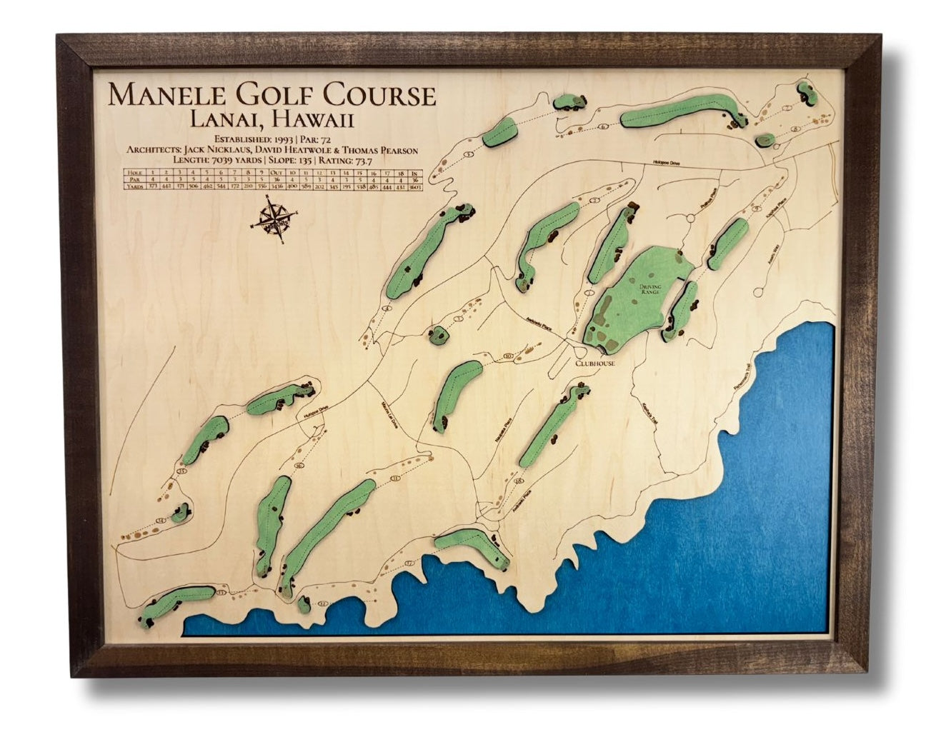 A wooden map of Manele Golf course in Lanai, Hawaii. Map is on a plain white background.
