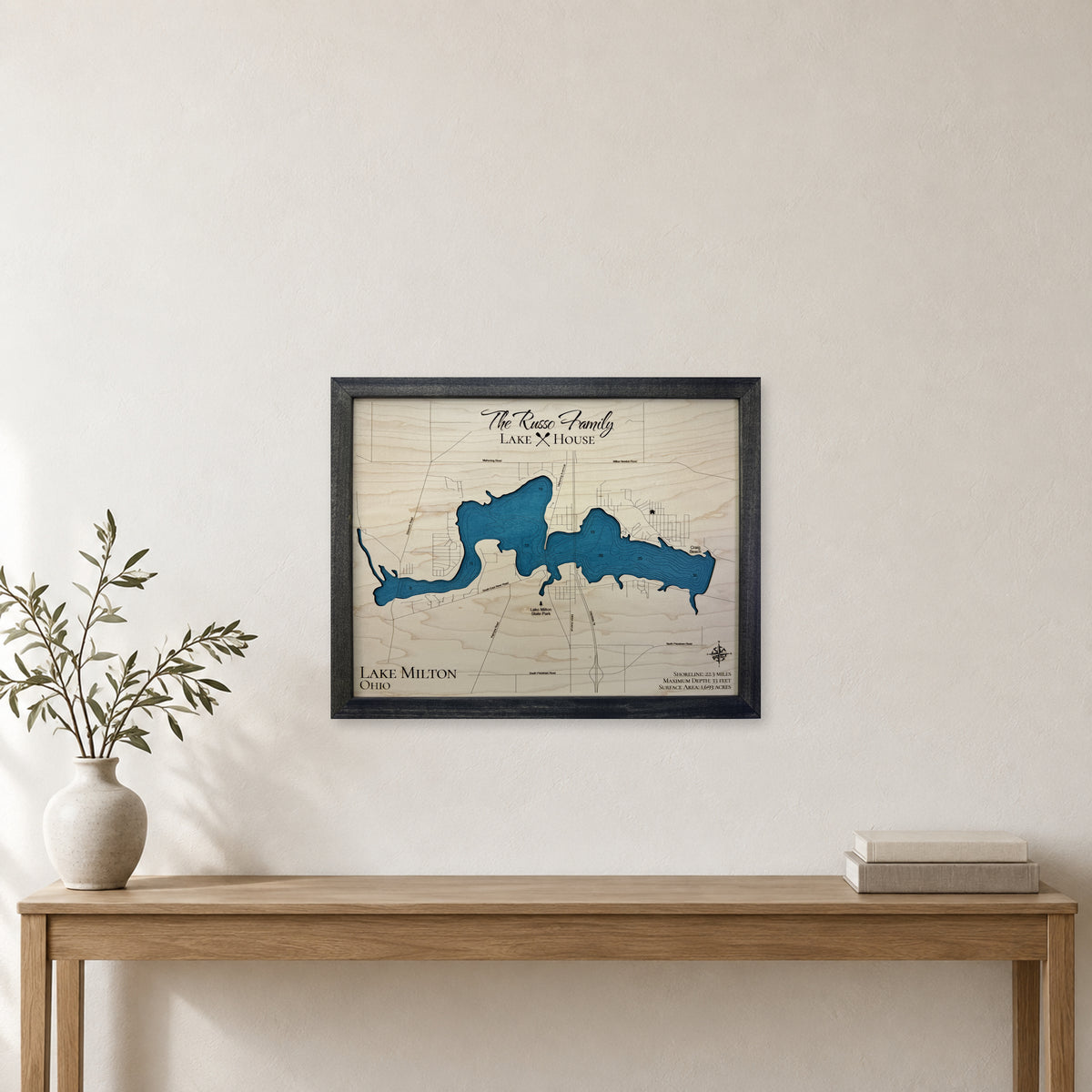 Milton Russo wood map — single layer with engraved contours, staged room mockup