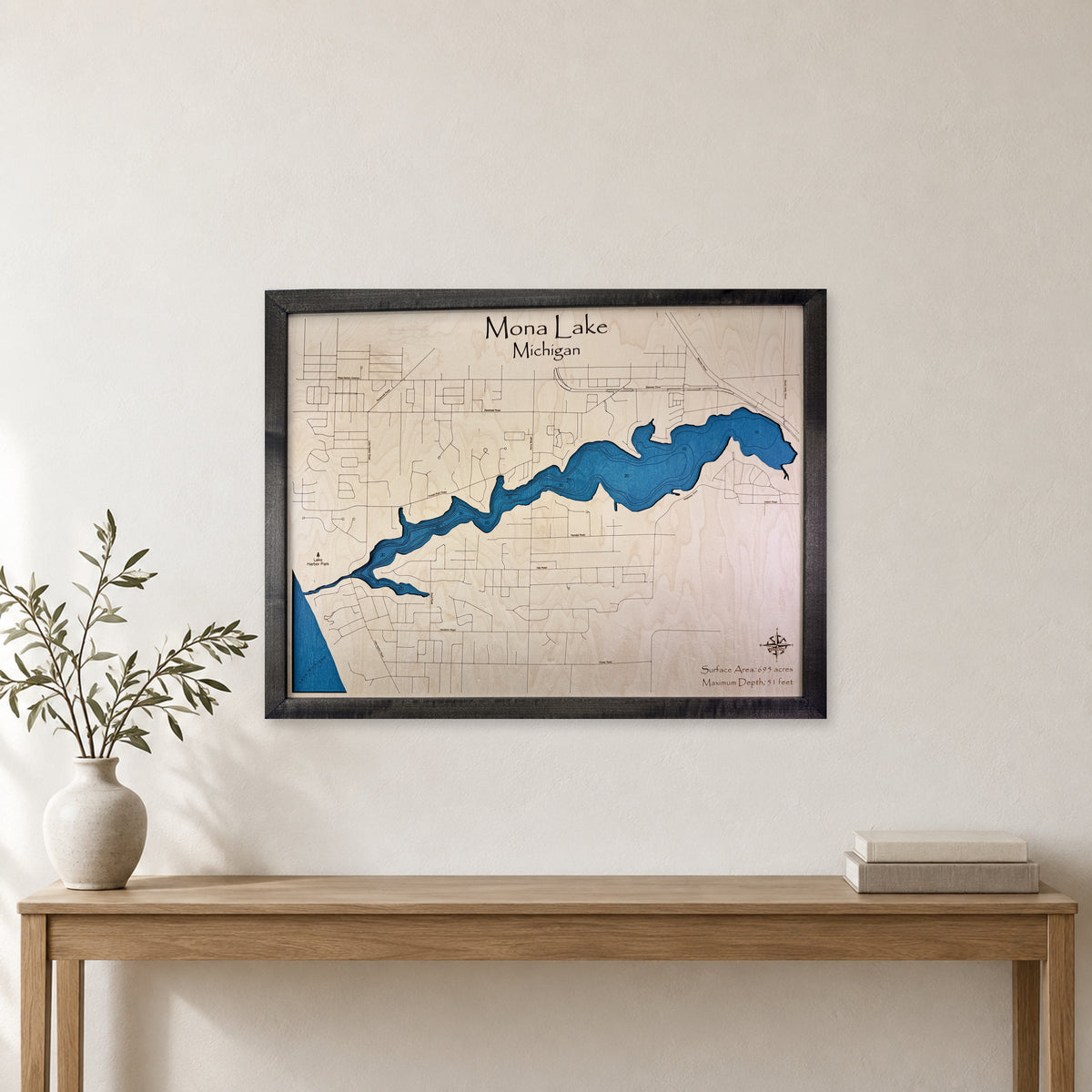 Mona Charcoal wood map — single layer with engraved contours, staged room mockup