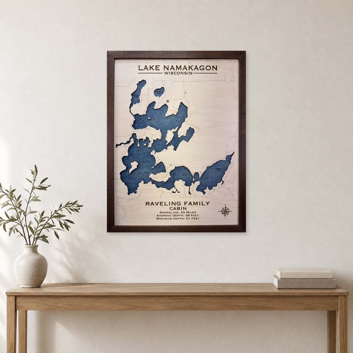 Namakagon Raveling wood map — single layer with engraved contours, staged room mockup