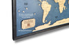 The nameplate on the world travel map with the option to add a QR code with your digital photo album. 
