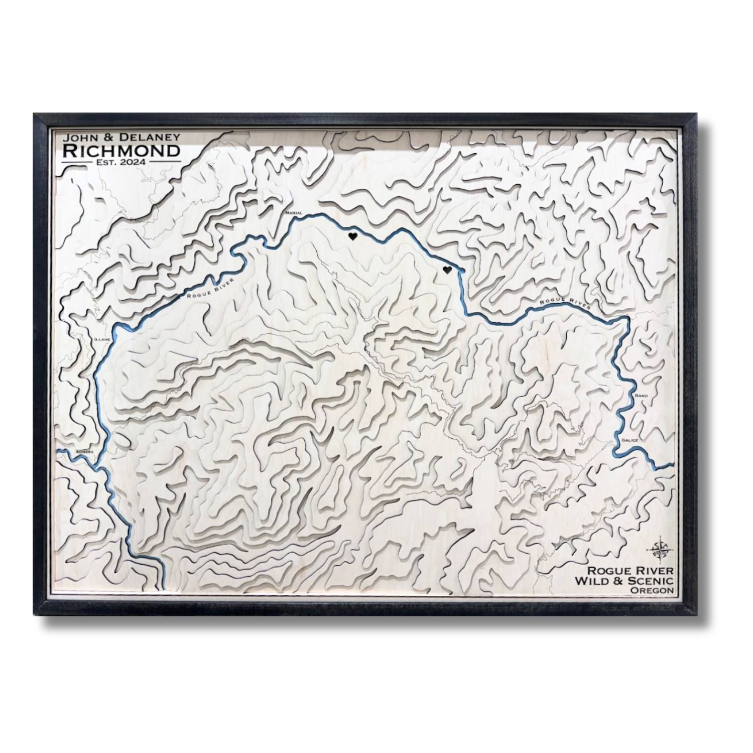 Custom wooden topographic map with a black frame on a white background