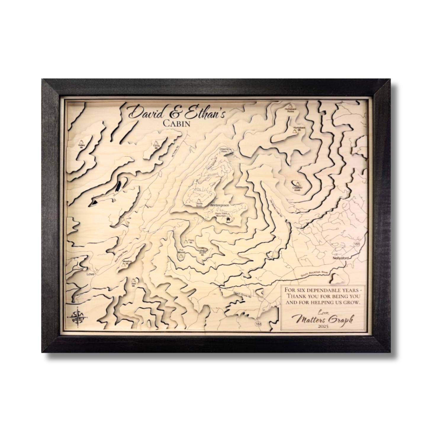 Framed topographic map with personalized text on a white background