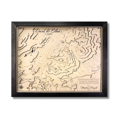Framed topographic map with personalized text on a white background