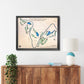 Framed golf course map on a wall above a wooden console table.