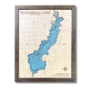 Wooden multi water layer map of Petenwell Lake with light blue water stain and a brown frame. 