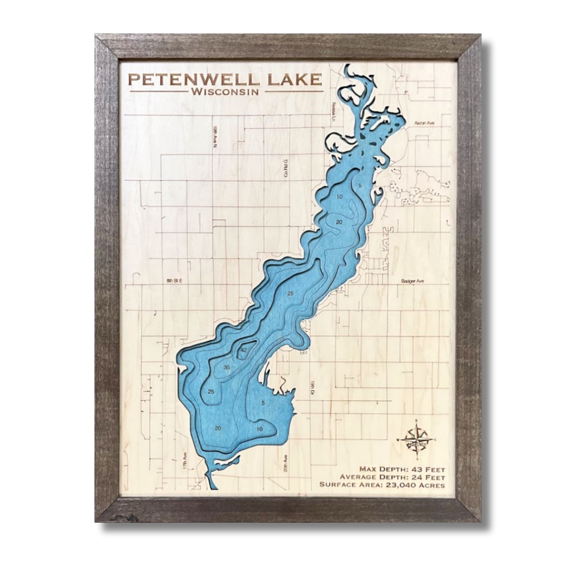 Wooden multi water layer map of Petenwell Lake with light blue water stain and a brown frame. 