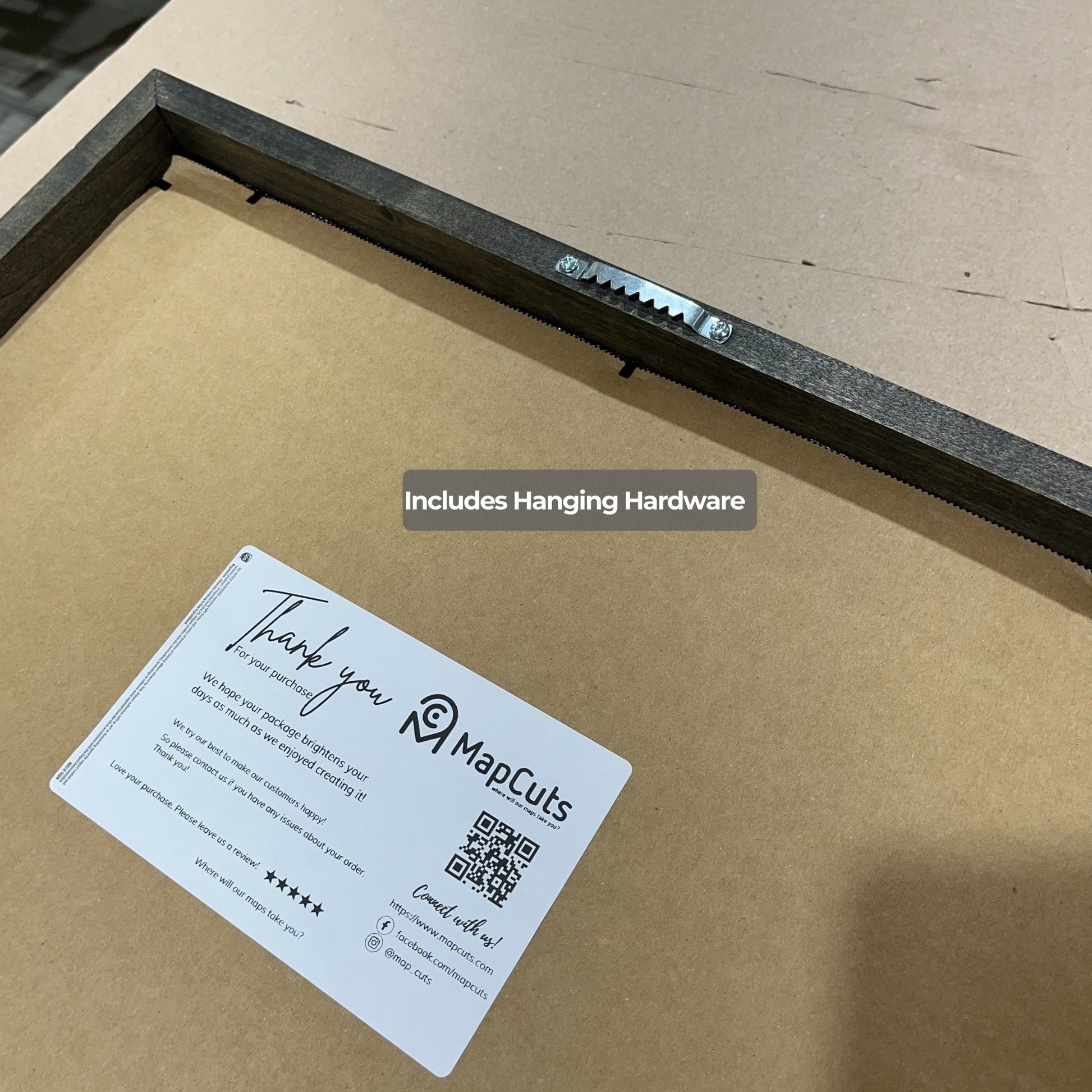 Image of the hardware used to hang maps.