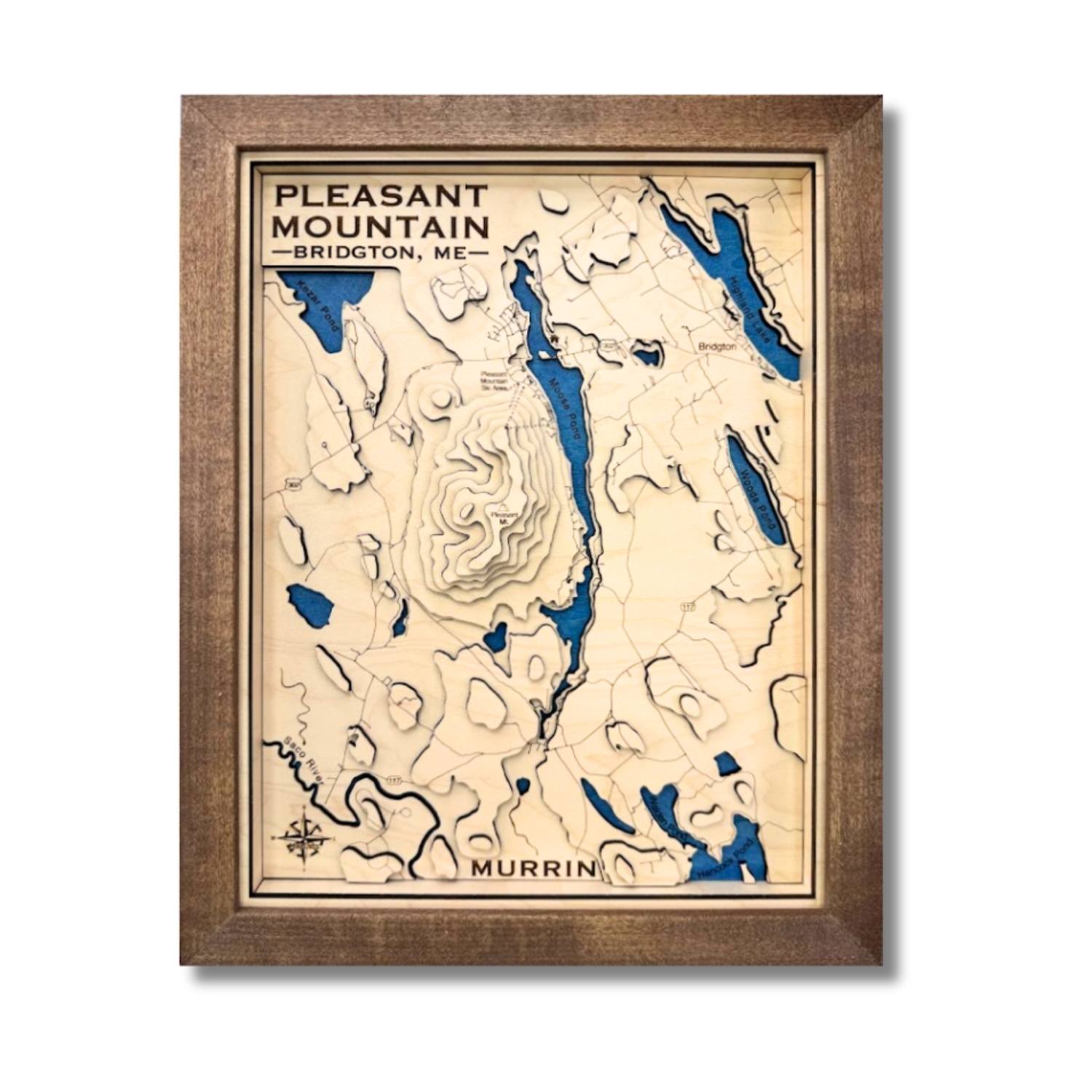 3D Wood topographic map of Pleasant Mountain, Maine with surrounding lakes. 