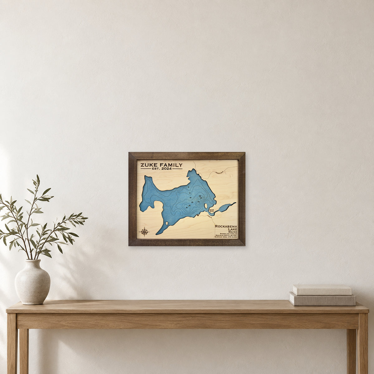 Rockabema Lake wood map — single layer with engraved contours, staged room mockup