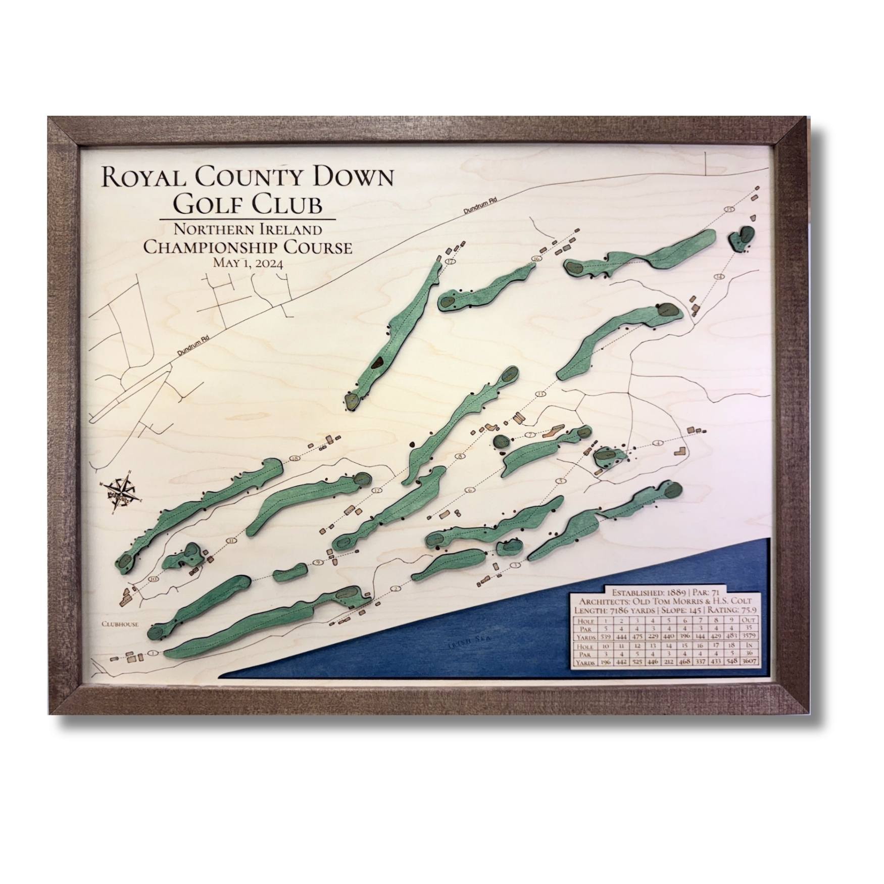 Framed wooden map of Royal County Down Golf Club with a walnut brown frame.