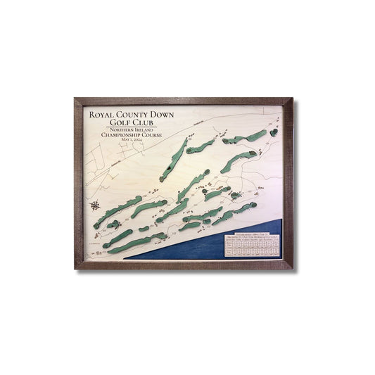Framed wooden golf map of Royal County Down Golf Club on a white background.