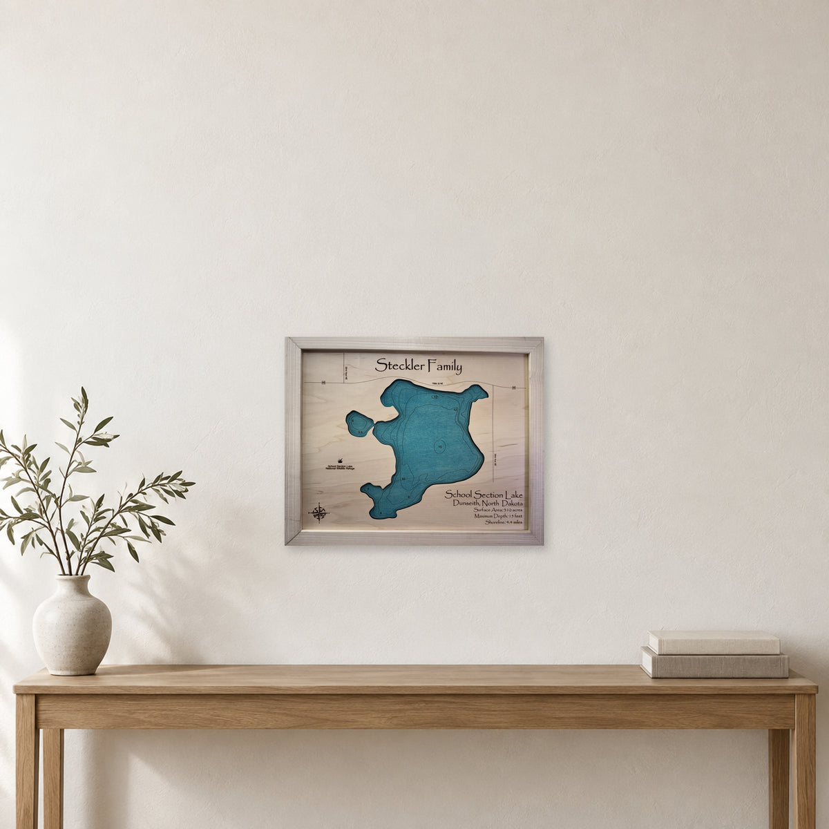 School Section Steckler wood map — single layer with engraved contours, staged room mockup