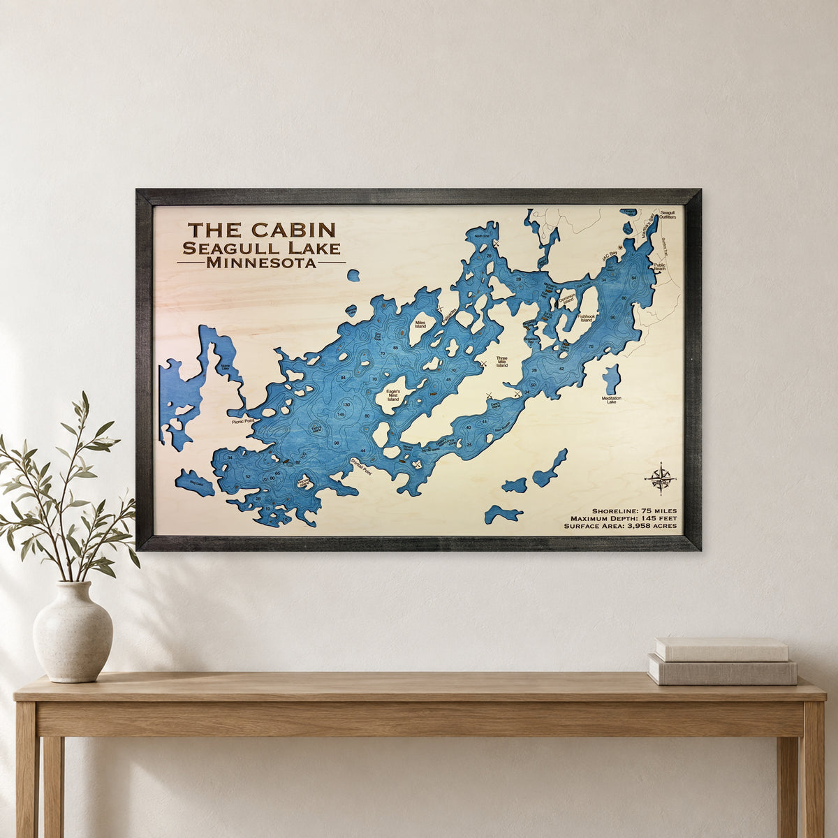 Seagull Cabin wood map — single layer with engraved contours, staged room mockup