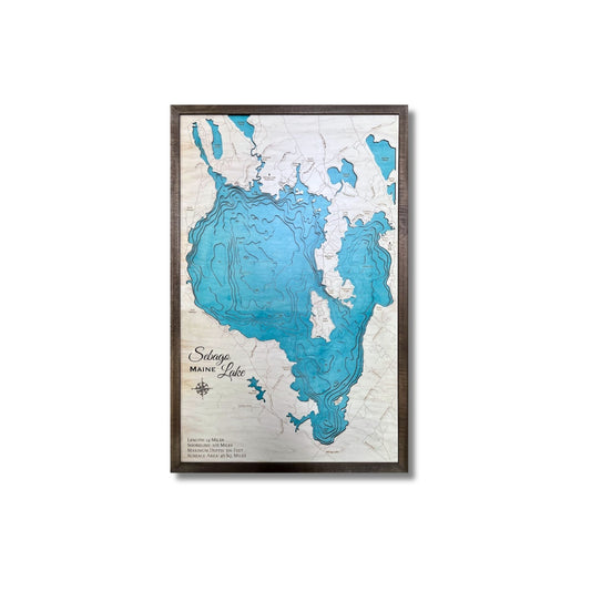 Sebago Lake multilayer map with light blue stain and a brown frame. 