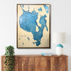 Custom Sebago Lake map hanging on the wall above a console. 
