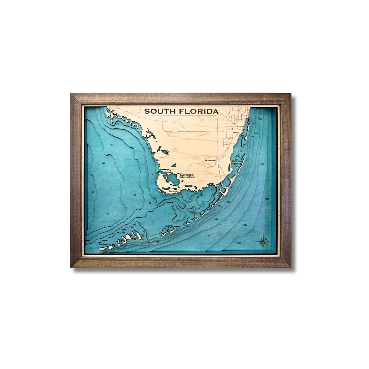 Wooden 3D map of south Florida and the Florida keys with blue water stain. 