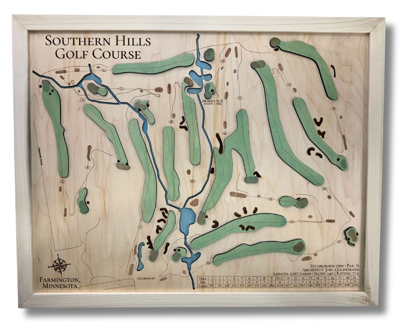 A wooden map of Southern Hills Golf Course with a natural colored frame.