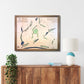 Framed wooden golf map of St. Ives Country Club on a wall above a wooden console table.