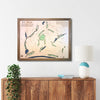 Framed wooden golf map of St. Ives Country Club on a wall above a wooden console table.