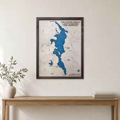 Sunapee Foote wood map — single layer with engraved contours, staged room mockup