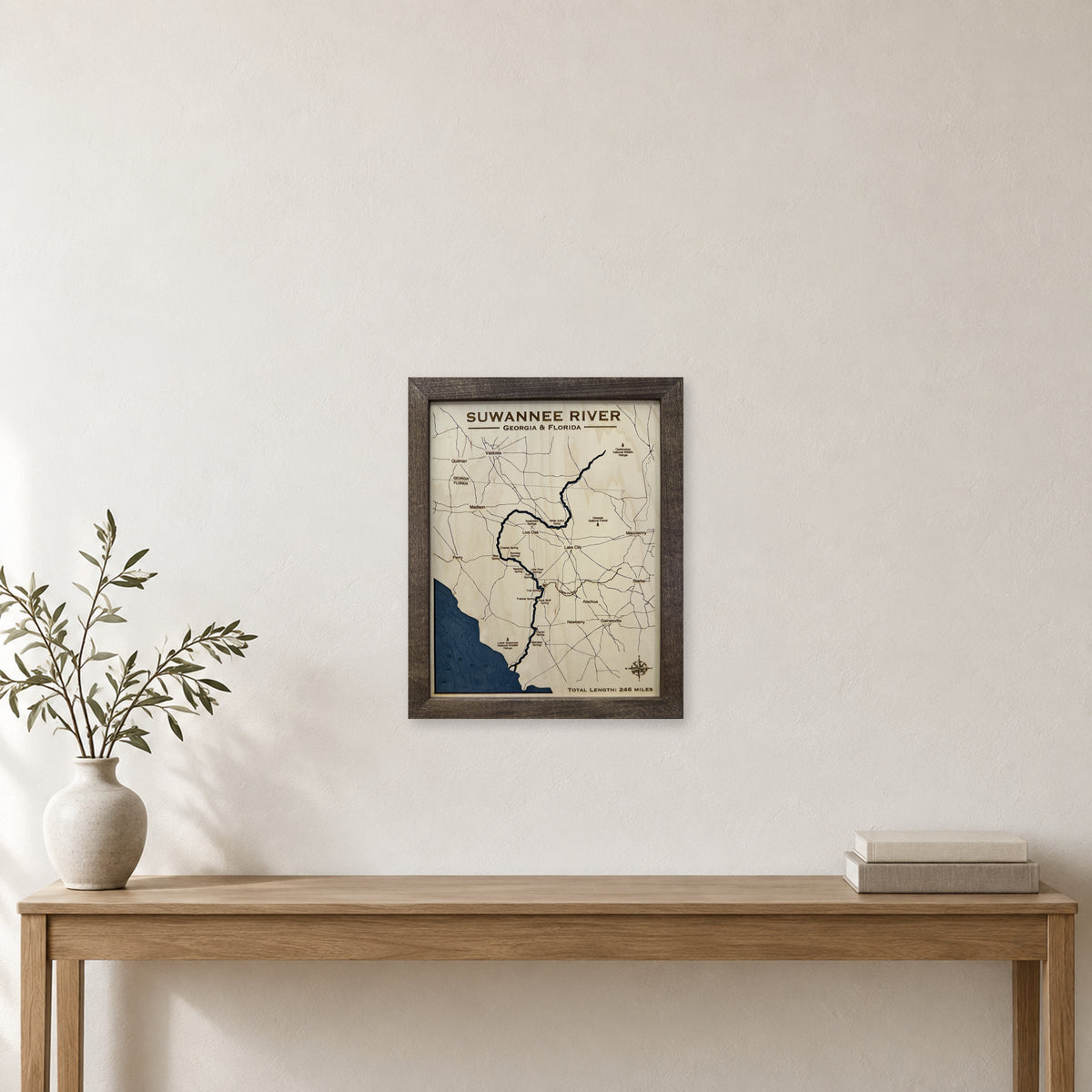 Suwannee Nipper wood map — single layer with engraved contours, staged room mockup