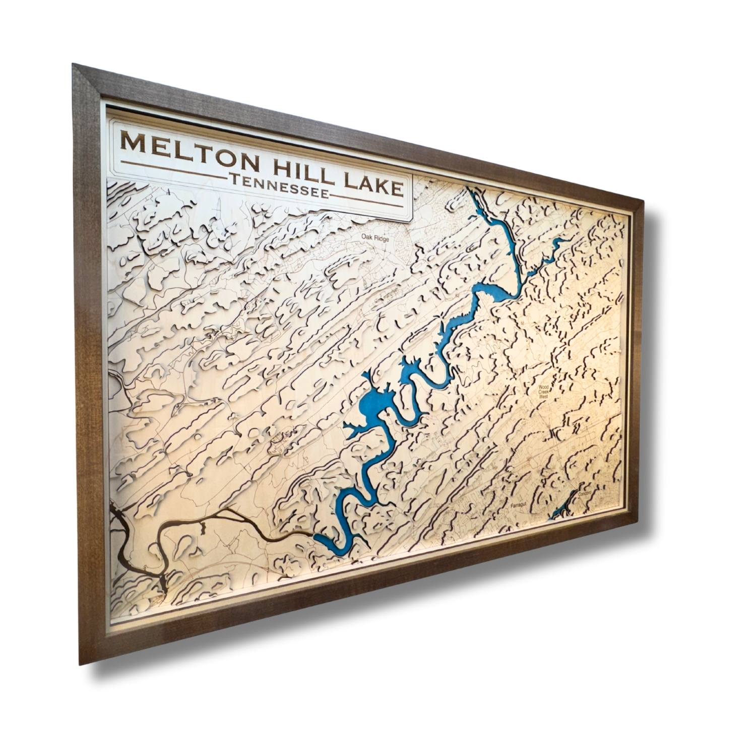 Sideview of Melton Hill Lake topographic wooden map where you can see the raised layers.