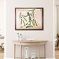 Framed wooden golf map of Tripoli Country Club on a wall above a wooden table.