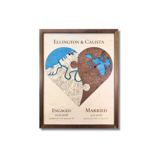 A 3D wooden heart-shaped map split into two sections, yin yang style, with each side showing a different city. 