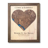 Custom heart-shaped wooden map on a white background. 