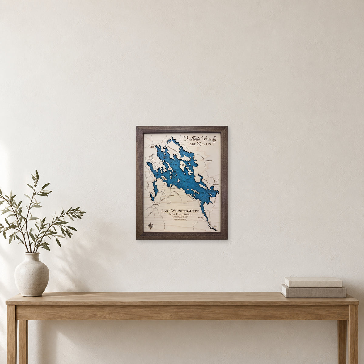 Winnipesaukee Ouellette wood map — single layer with engraved contours, staged room mockup