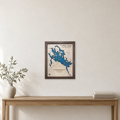 Winnipesaukee Ouellette wood map — single layer with engraved contours, staged room mockup