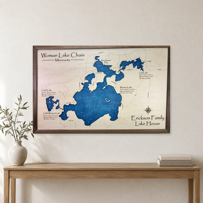 Woman Lake Erickson wood map — single layer with engraved contours, staged room mockup